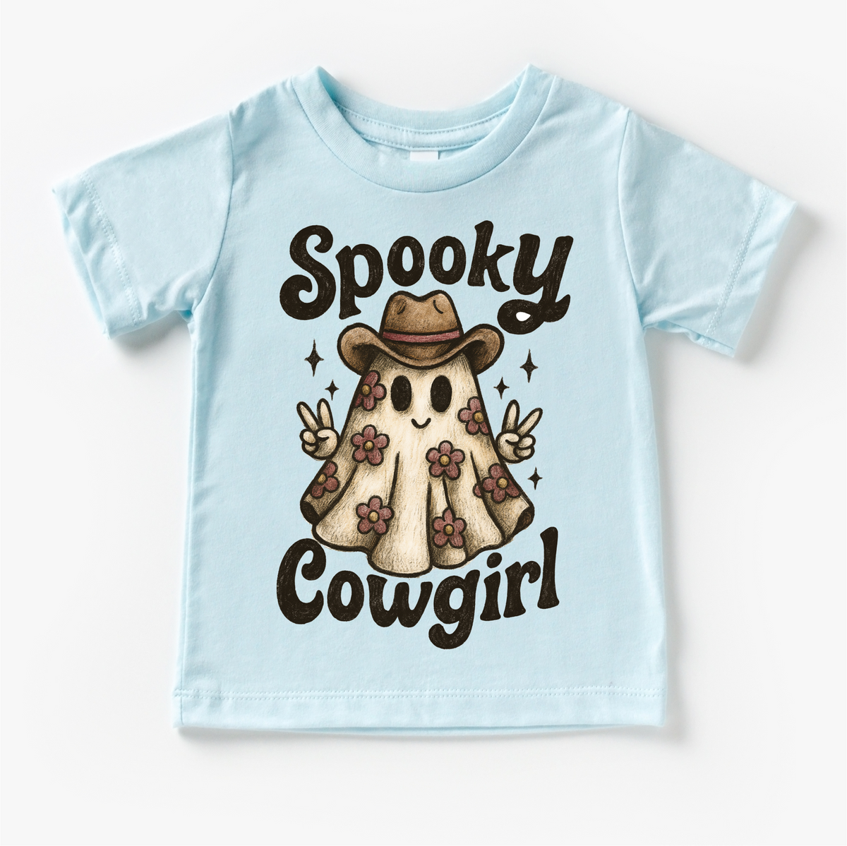 Spooky Cowgirl Halloween design on a blue garment.