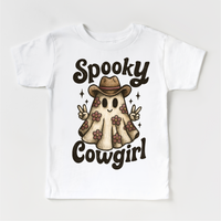 Spooky Cowgirl Halloween design on a white garment.