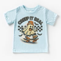 Creep It Real Skateboard Ghost Halloween design on a blue garment.