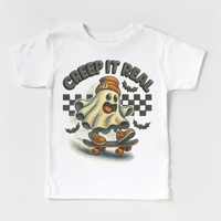 Creep It Real Skateboard Ghost Halloween design on a white garment.