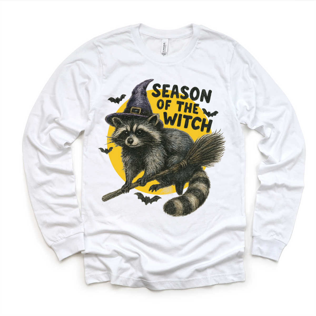 Season Of The Witch Raccoon Halloween design on a long sleeve shirt.