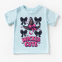 Wicked Cute Witch design on a blue garment.