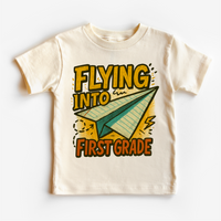 Flying Into First Grade Back To School | First Day Of School graphic T-shirt by Madi Moosh