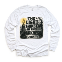 The Light Shineth In The Darkness design on a long sleeve shirt.