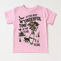 Most Wonderful Time Of The Year design on a pink garment.
