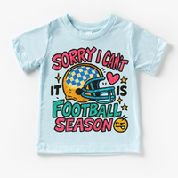 Sorry I Can't It Is Football Season design on a blue garment.