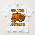 Tis the Season pumpkin and football graphic on a white Comfort Colors T-shirt