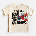 Just a Kid Who Loves Planes natural kids shirt with colorful red and blue airplane graphic