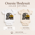 Just a Kid Who Loves Dump Trucks baby bodysuit options in white and natural