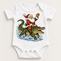 Santa riding an alligator Christmas design on a white bodysuit by Madi Moosh