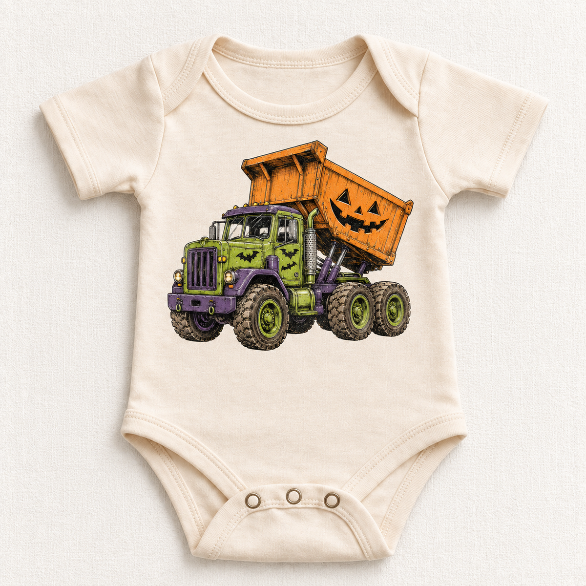 natural bodysuit with Halloween dump truck and jack-o-lantern design