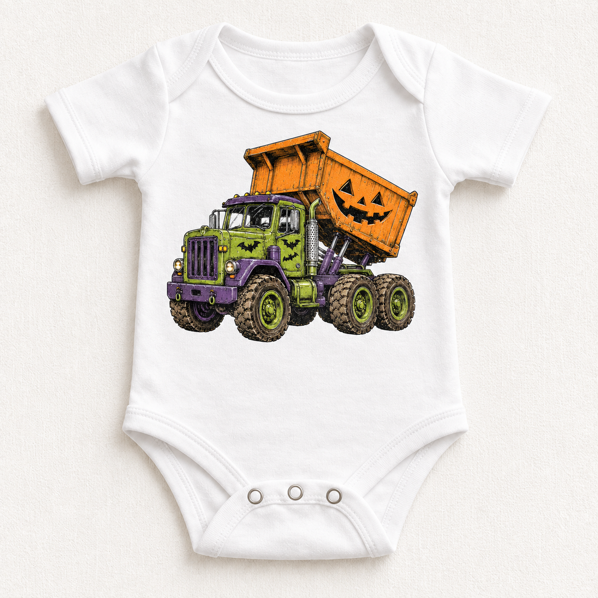 white bodysuit with Halloween dump truck and jack-o-lantern design