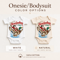 Merry Quackmas baby bodysuits in white and natural