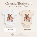 White and natural baby bodysuits with a vintage Santa riding a smiling pink pig Christmas design