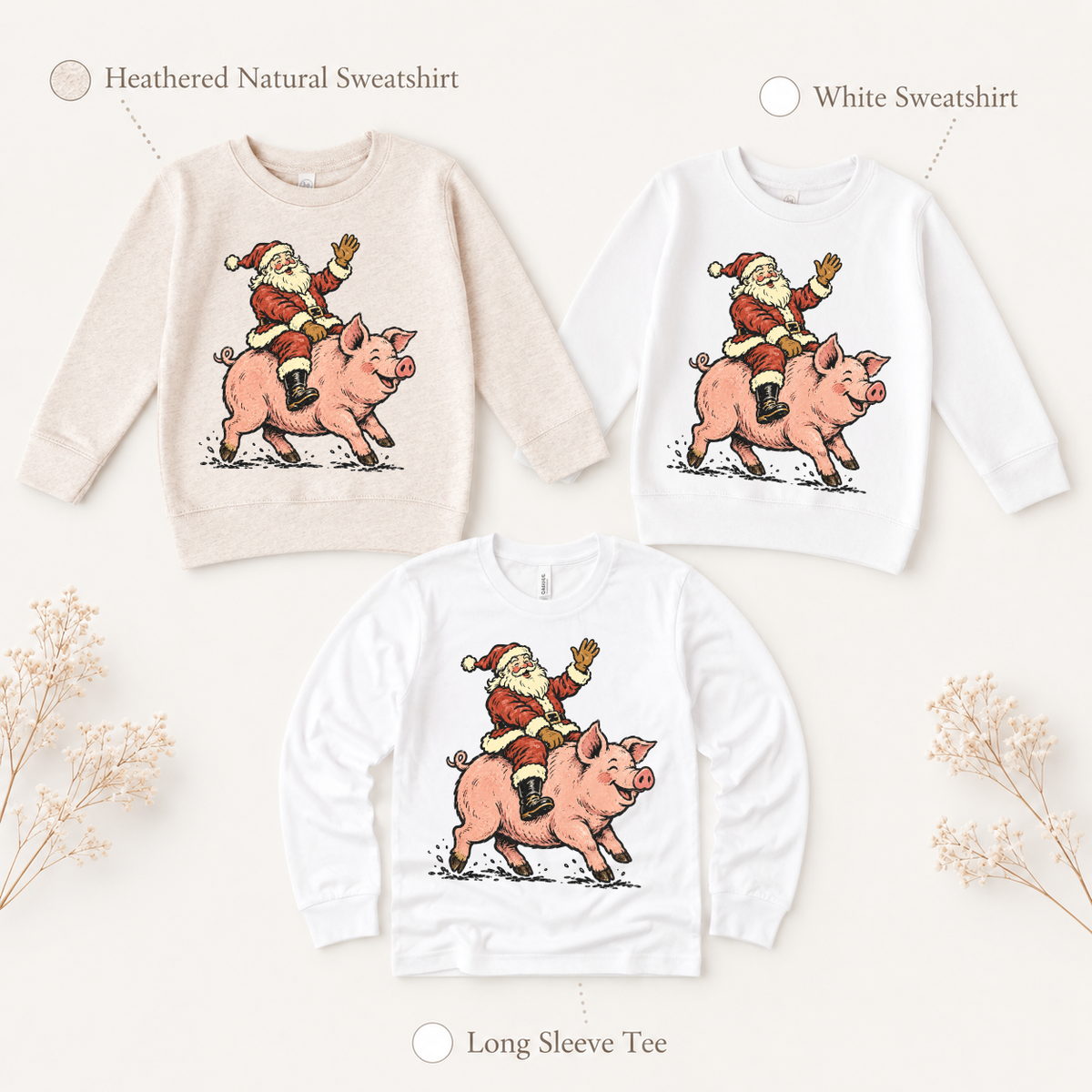 Santa riding a pink pig Christmas design on heathered natural and white sweatshirts and a white long-sleeve tee