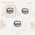 Long Dog Holiday Express Christmas graphic on natural heather and white sweatshirts and a white long sleeve tee.