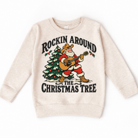Rockin Around the Christmas Tree cowboy Santa guitar graphic on Natural Heather Sweatshirt