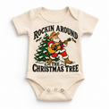 Rockin Around the Christmas Tree cowboy Santa guitar graphic on Natural Onesie