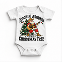 Rockin Around the Christmas Tree cowboy Santa guitar graphic on White Onesie