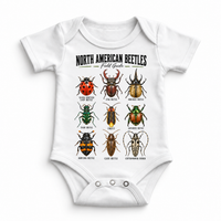 Beetle field guide graphic on a white baby bodysuit