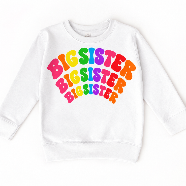 Big Sister rainbow arched lettering on white sweatshirt