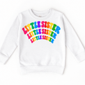 Little Sister rainbow arched lettering on white sweatshirt