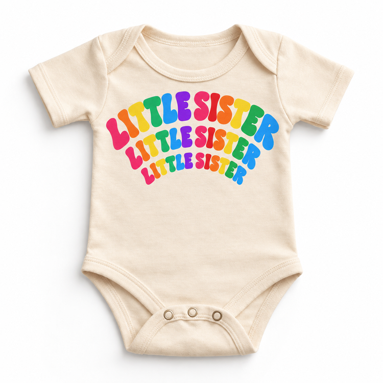 Little Sister rainbow arched lettering on natural baby bodysuit
