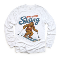 I'd Rather Be Skiing retro Bigfoot design on a white long sleeve tee