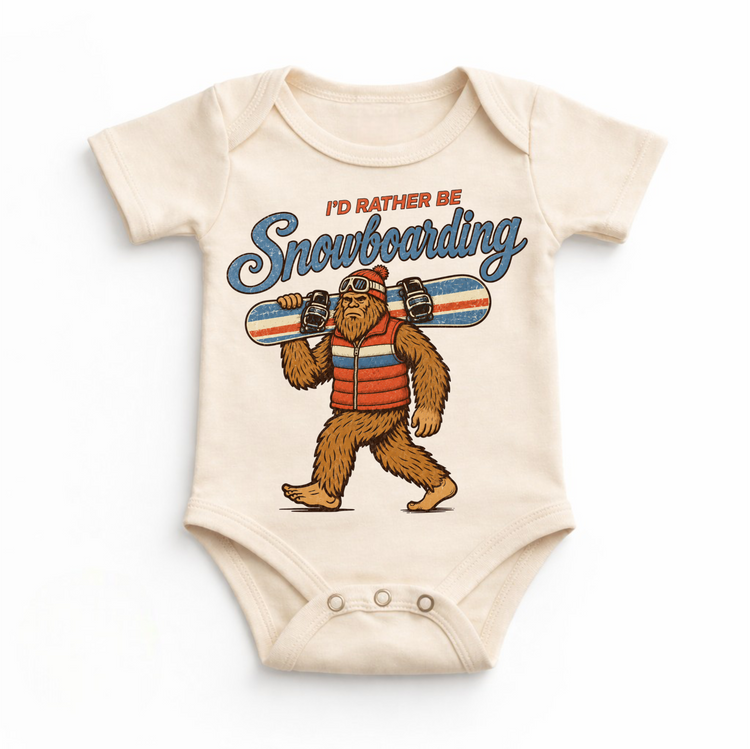 I'd Rather Be Snowboarding retro Bigfoot design on a natural baby bodysuit