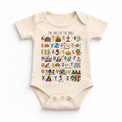 The ABCs of the Bible colorful Christian alphabet design on a natural baby bodysuit