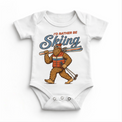 I'd Rather Be Skiing retro Bigfoot carrying skis design on a white baby bodysuit