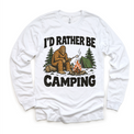 I'd Rather Be Camping Bigfoot roasting a marshmallow by a campfire on a white long sleeve tee