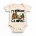 I'd Rather Be Camping Bigfoot roasting a marshmallow by a campfire on a natural baby bodysuit