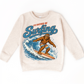I'd Rather Be Surfing Bigfoot riding a wave design on a natural heather sweatshirt