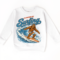 I'd Rather Be Surfing Bigfoot riding a wave design on a white sweatshirt