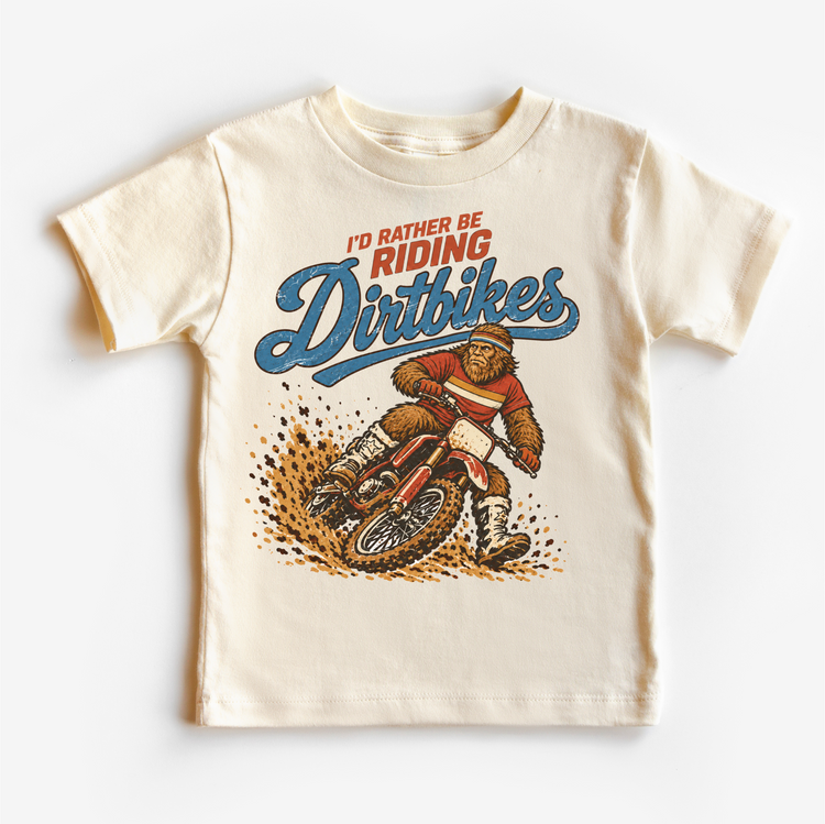 I'd Rather Be Riding Dirtbikes Bigfoot on a dirt bike design on a natural short sleeve tee