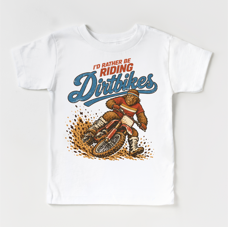 I'd Rather Be Riding Dirtbikes Bigfoot on a dirt bike design on a white short sleeve tee