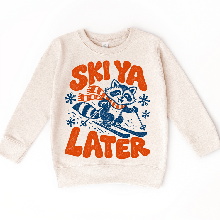 Ski Ya Later skiing raccoon in navy and orange on a natural heather sweatshirt