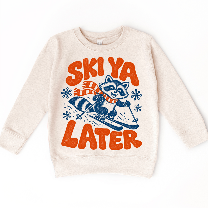 Ski Ya Later skiing raccoon in navy and orange on a natural heather sweatshirt