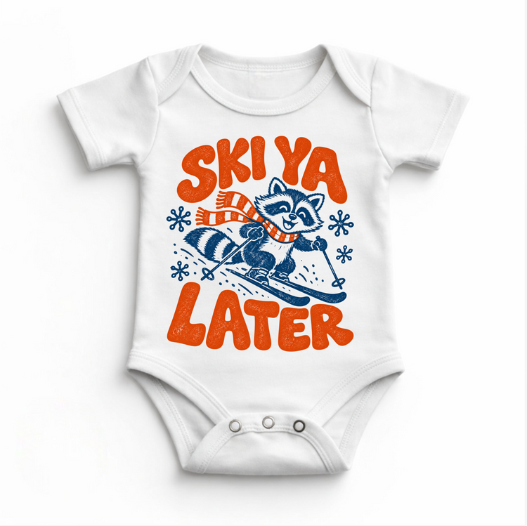 Ski Ya Later skiing raccoon in navy and orange on a white baby bodysuit