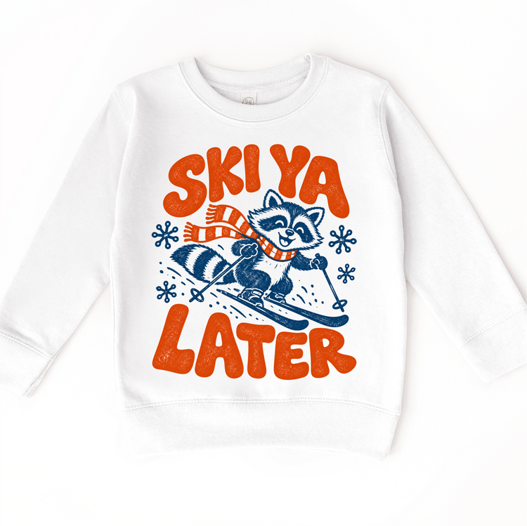 Ski Ya Later skiing raccoon in navy and orange on a white sweatshirt