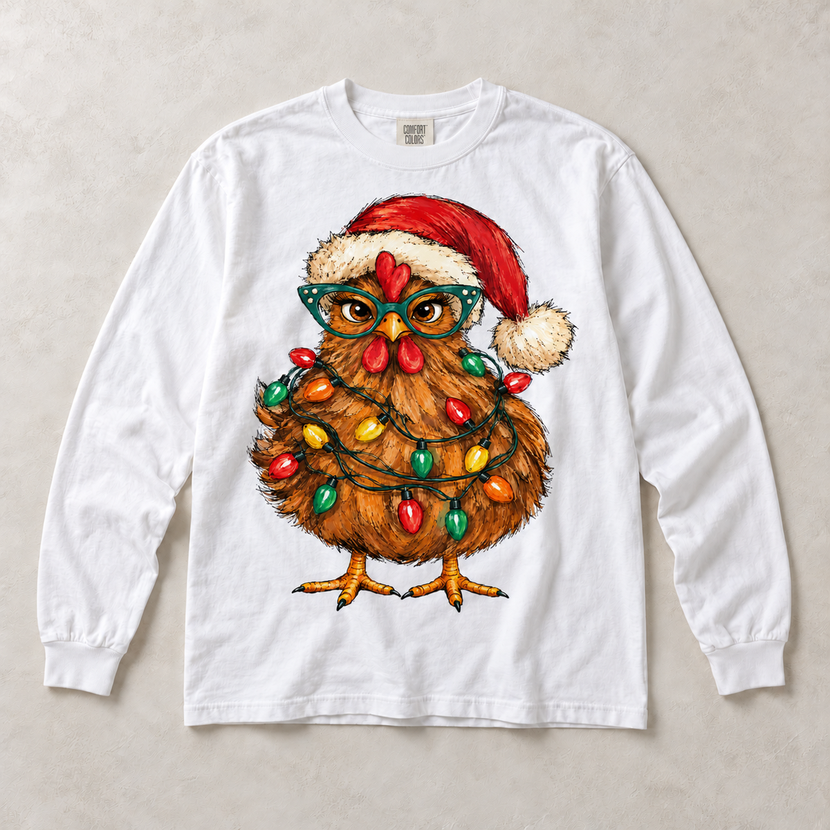 White Comfort Colors long-sleeve T-shirt with Christmas chicken in Santa hat and colorful holiday lights
