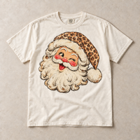 Ivory Comfort Colors short-sleeve T-shirt with vintage winking leopard Santa graphic