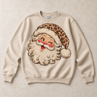 Sand Gildan crewneck sweatshirt with vintage winking leopard Santa graphic
