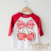 Love You Cherry Much Valentine's Day design on a red-accented shirt.