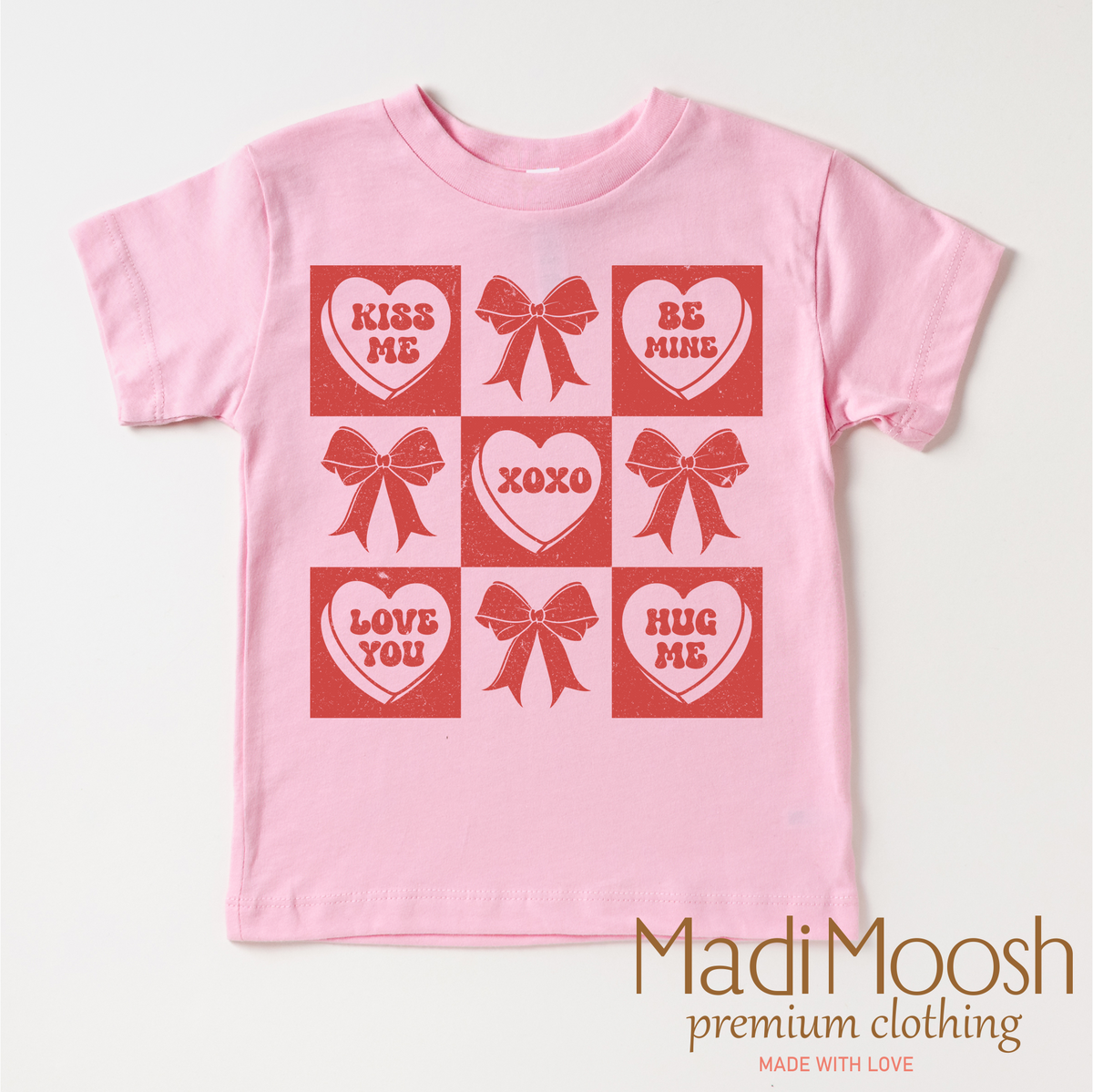 Candy Hearts And Bows Valentine's Day design on a pink garment.