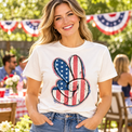 Adult woman wearing American Flag Peace Sign Shirt