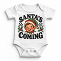 Santa's Coming Christmas graphic on white bodysuit, front view on white background
