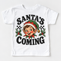Santa's Coming Christmas graphic on white tee, front view on white background