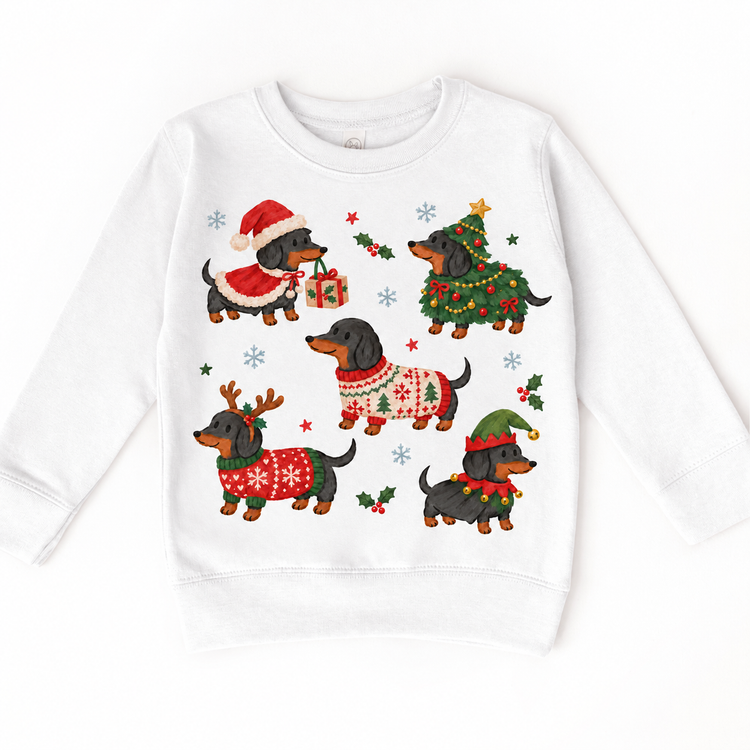 white sweatshirt with five dachshunds in Christmas costumes, holly and snowflakes